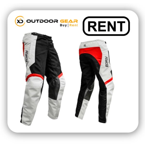 Man and woman riding motorcycles wearing riding pants rented from XDogTrekking.com